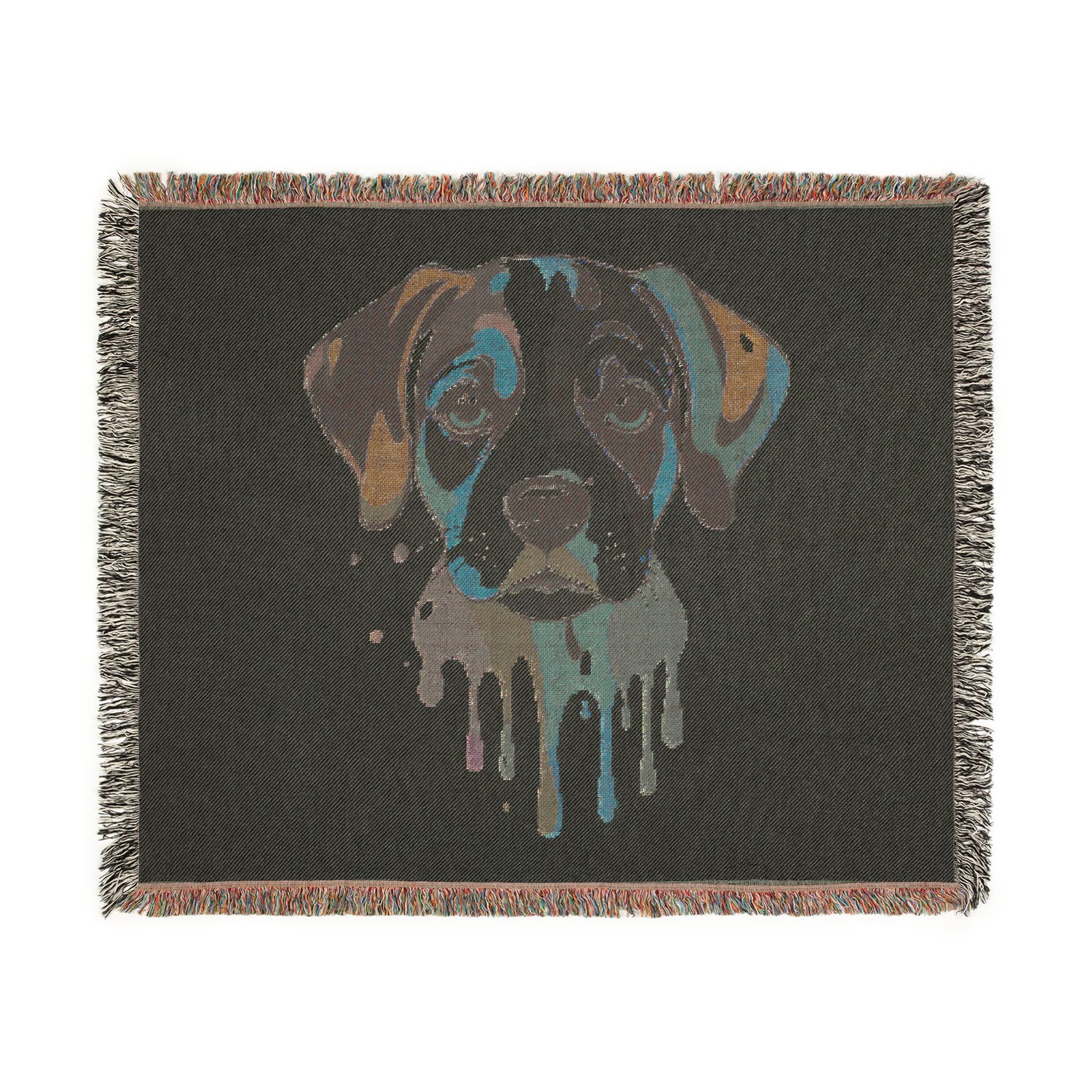 Blanket with a dog's face design on a black background