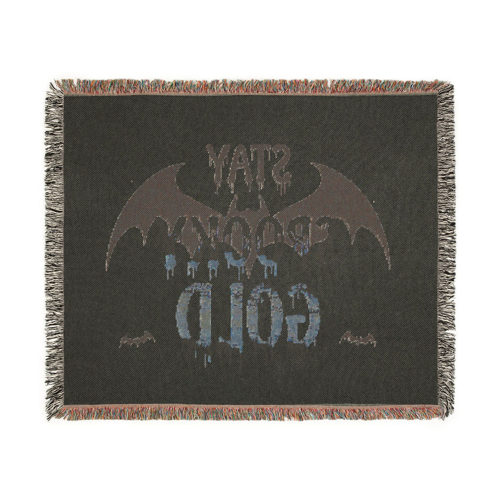Black blanket with bat design and text on a white background