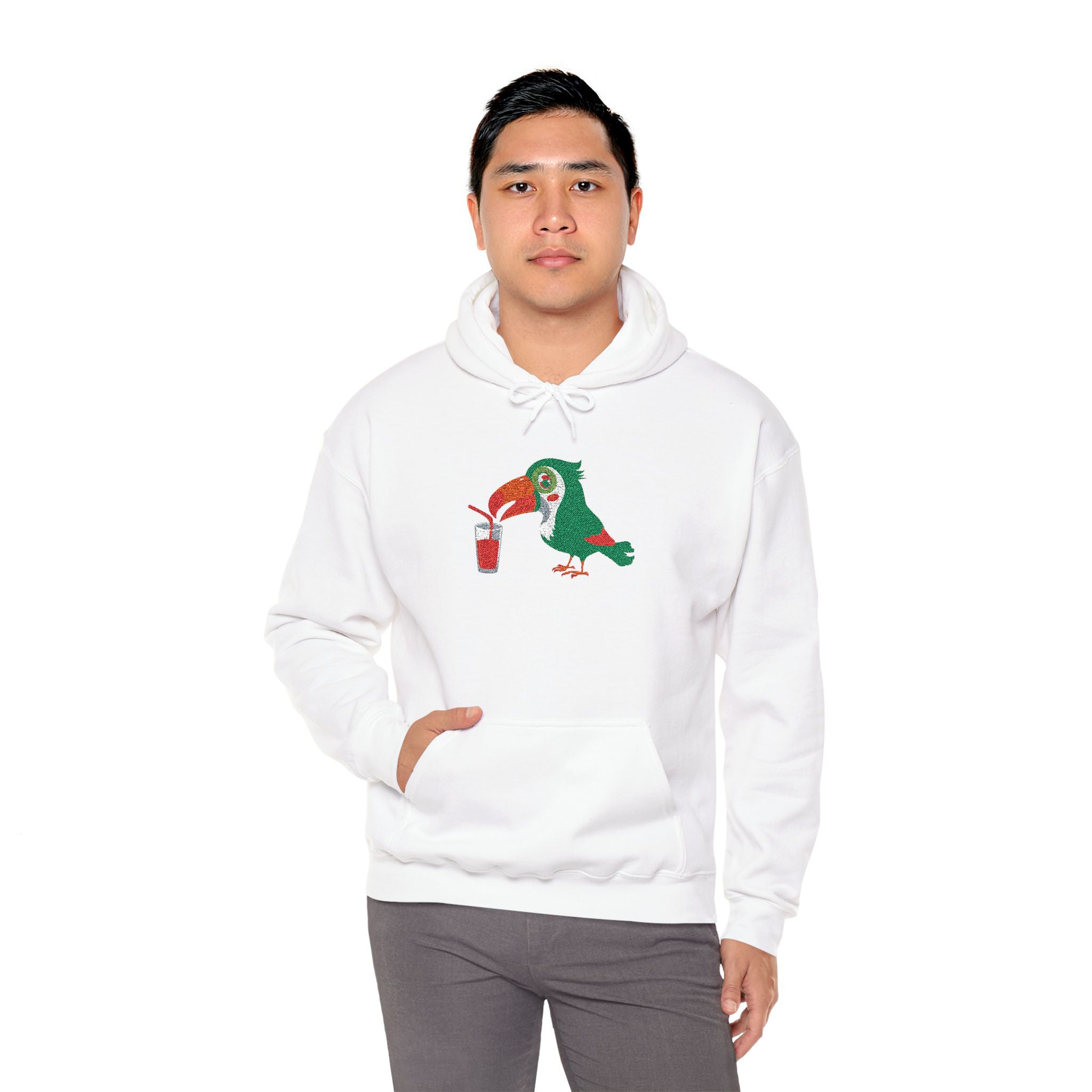 Person wearing a white hoodie with a colorful parrot design on a white background