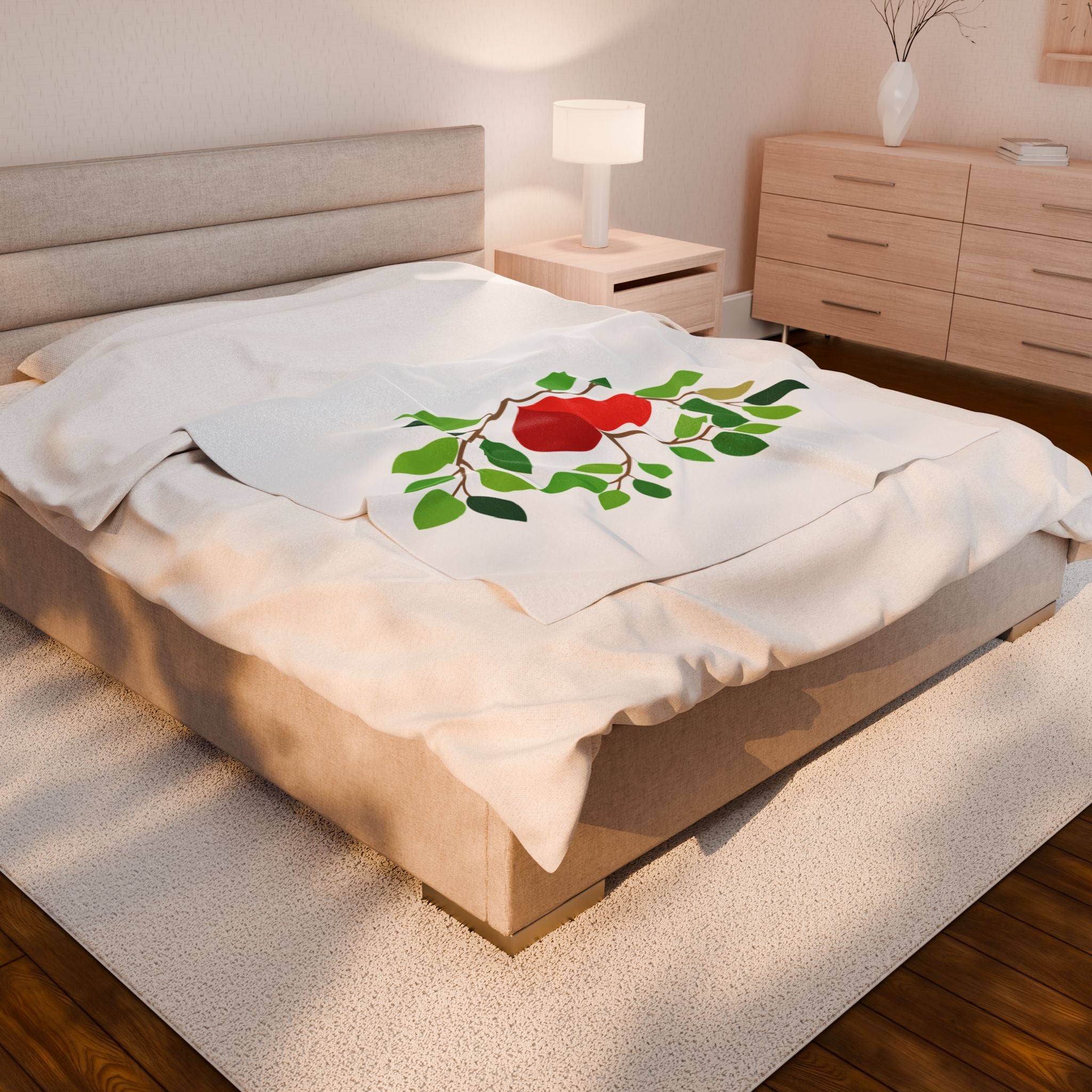 Bed with a decorative pillow featuring a red flower design in a bedroom setting.