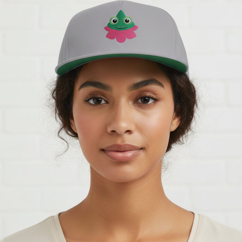 Gray cap with a pink and green frog design on a white background