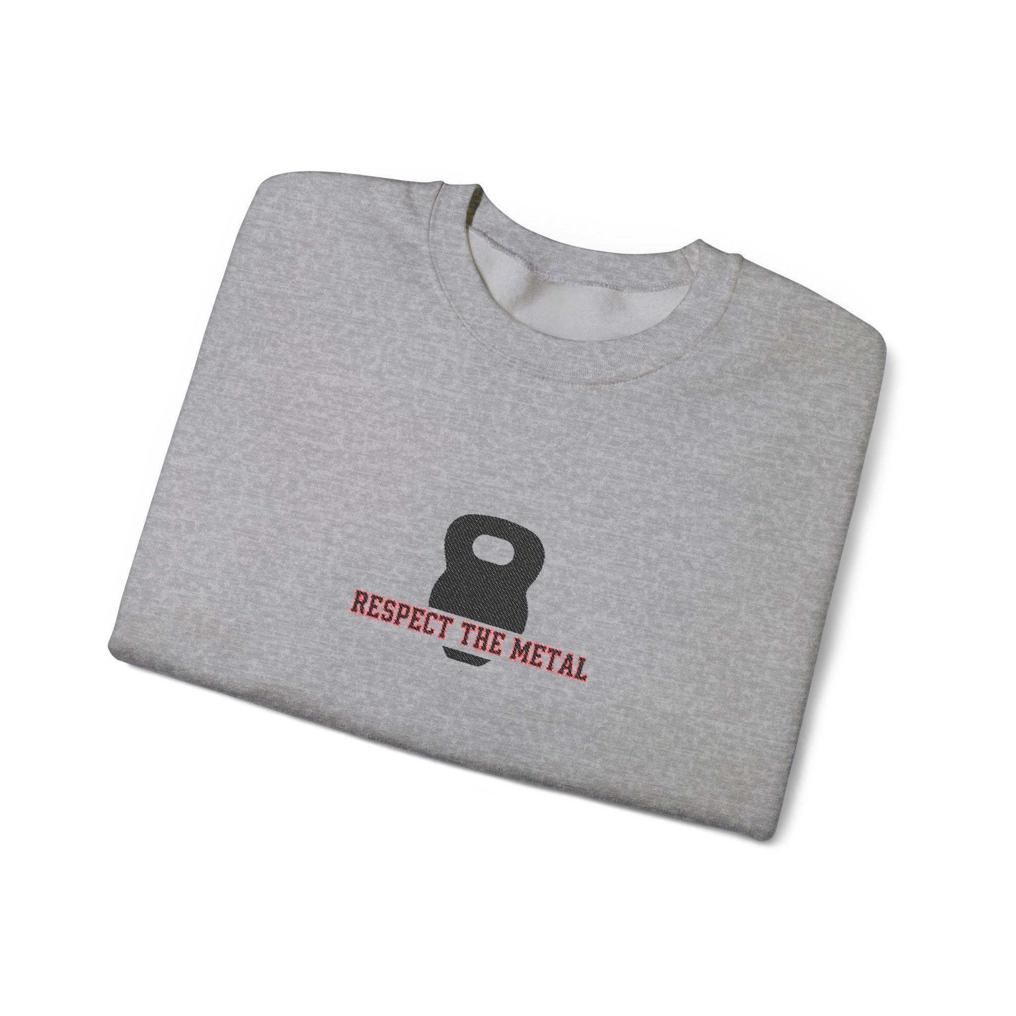 Folded gray t-shirt with kettlebell graphic and 'Respect the Metal' text on a white background