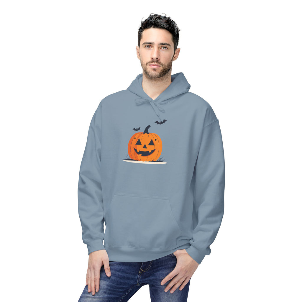 Man wearing a light blue hoodie with a Halloween pumpkin design on a white background