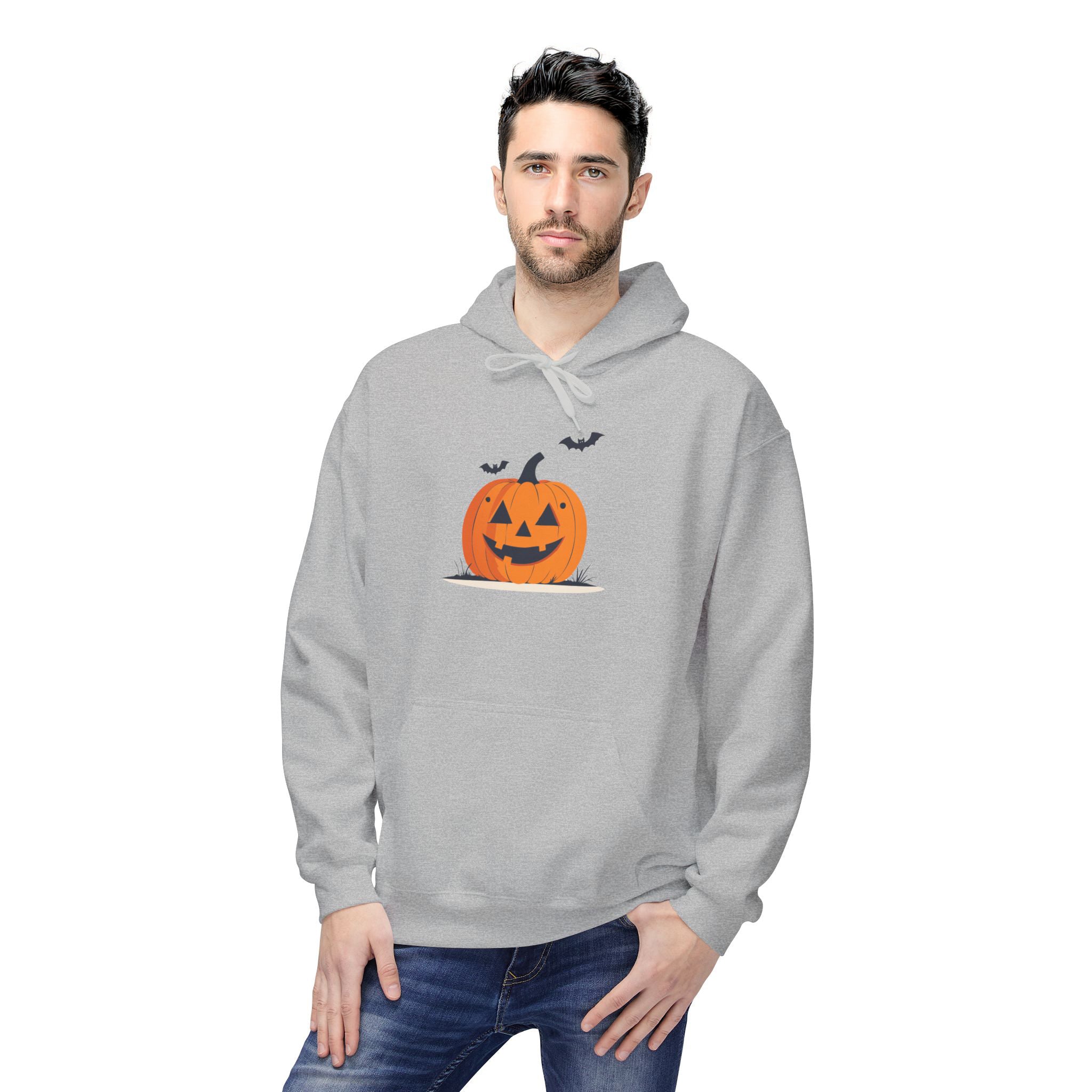 Man wearing a gray hoodie with a Halloween pumpkin design on a white background