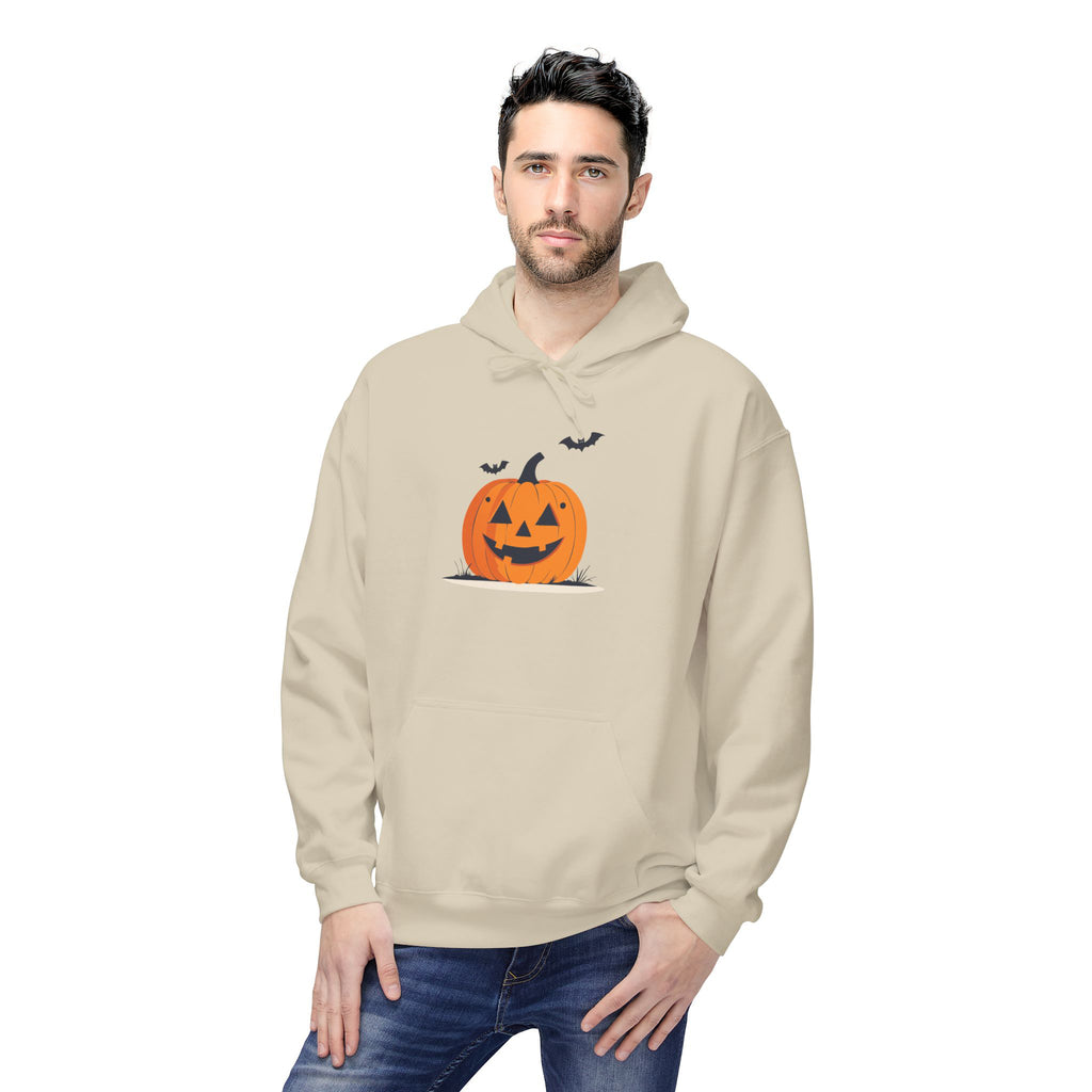 Man wearing a beige hoodie with a Halloween pumpkin design on a white background