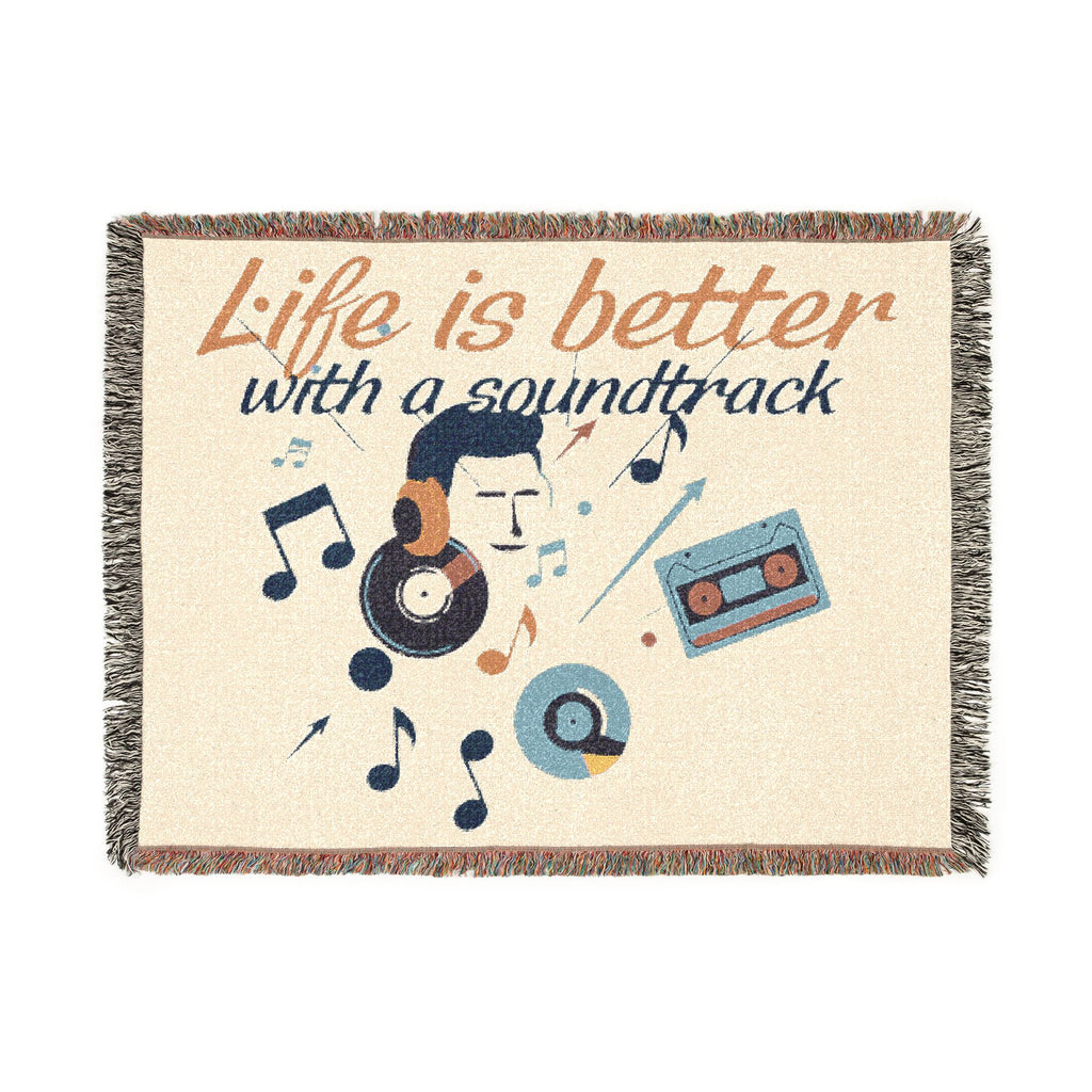 Blanket with musical design and 'Life is better with a soundtrack' text on a beige background