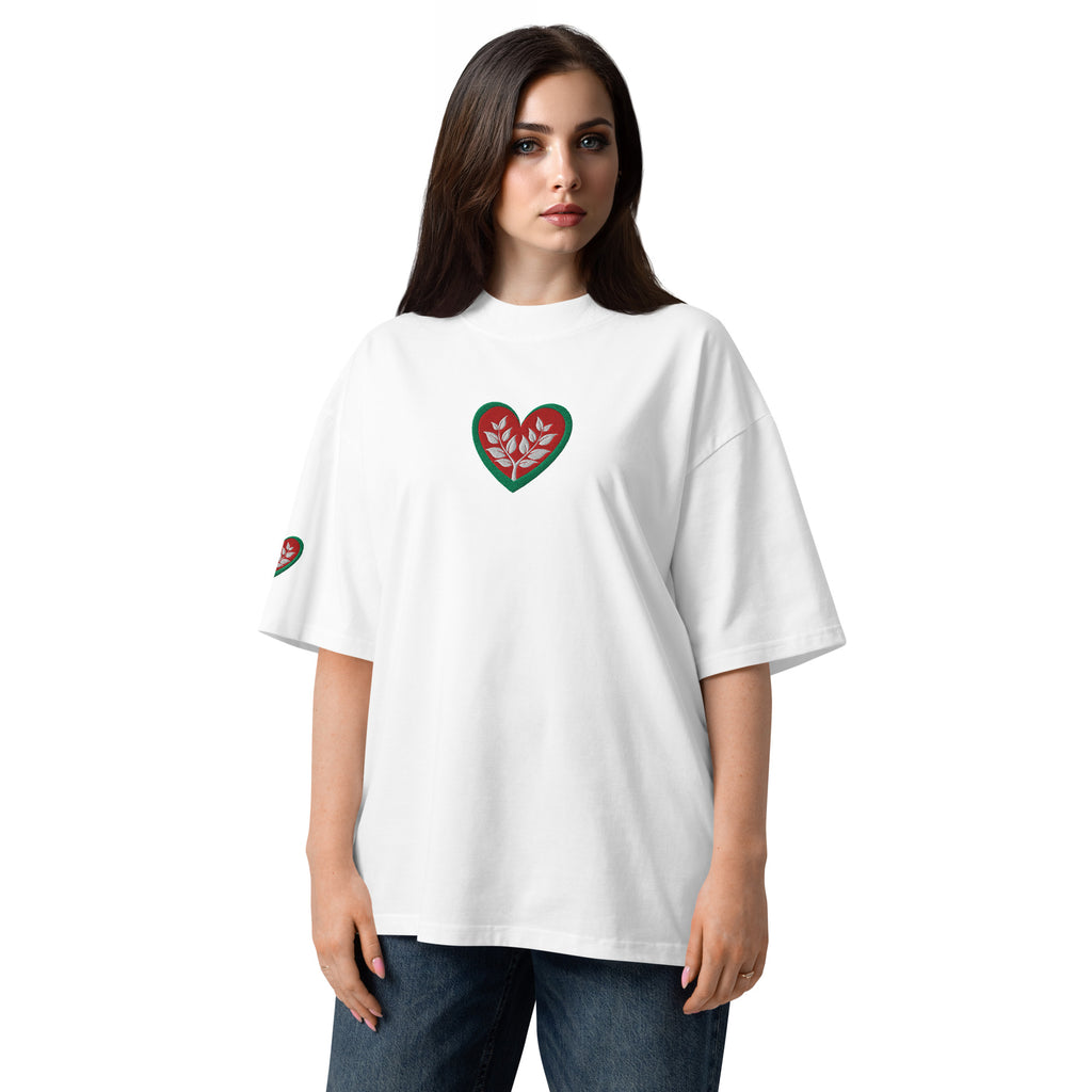 Woman wearing a white t-shirt with a heart design on a white background