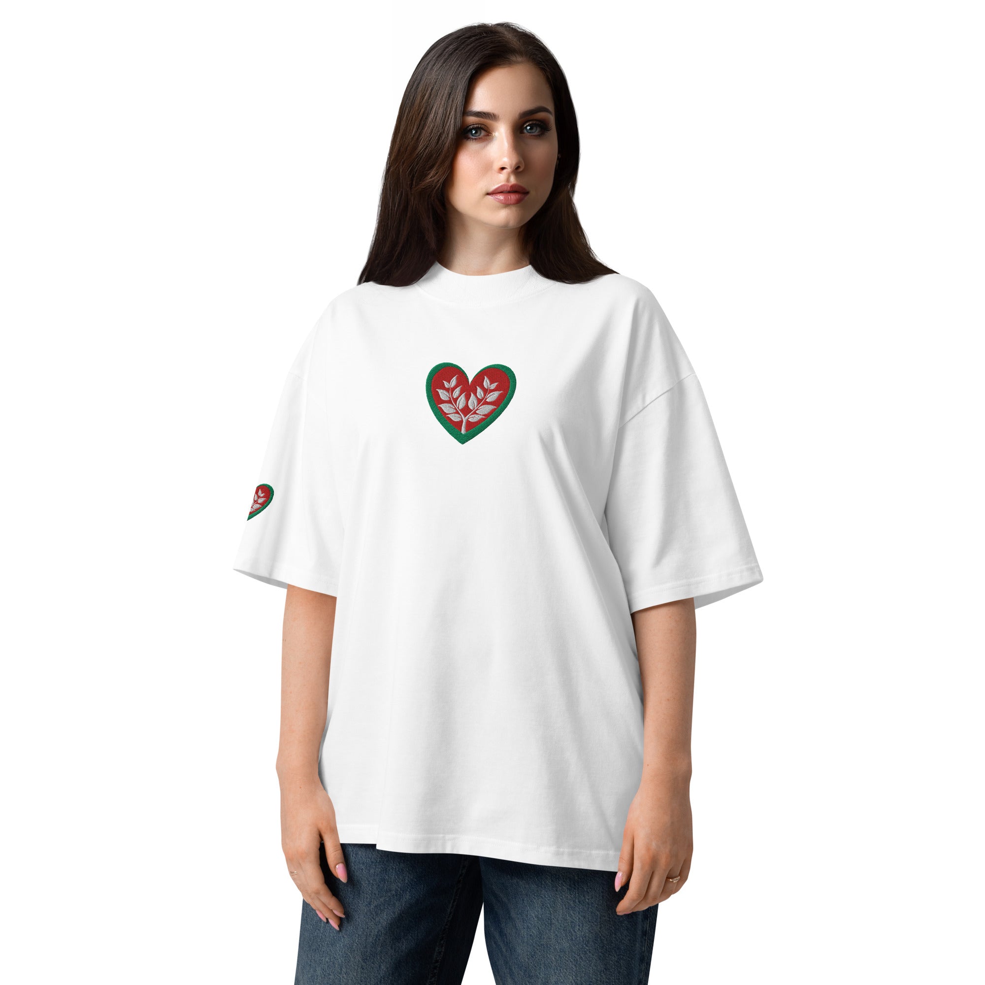 Woman wearing a white t-shirt with a heart design on a white background