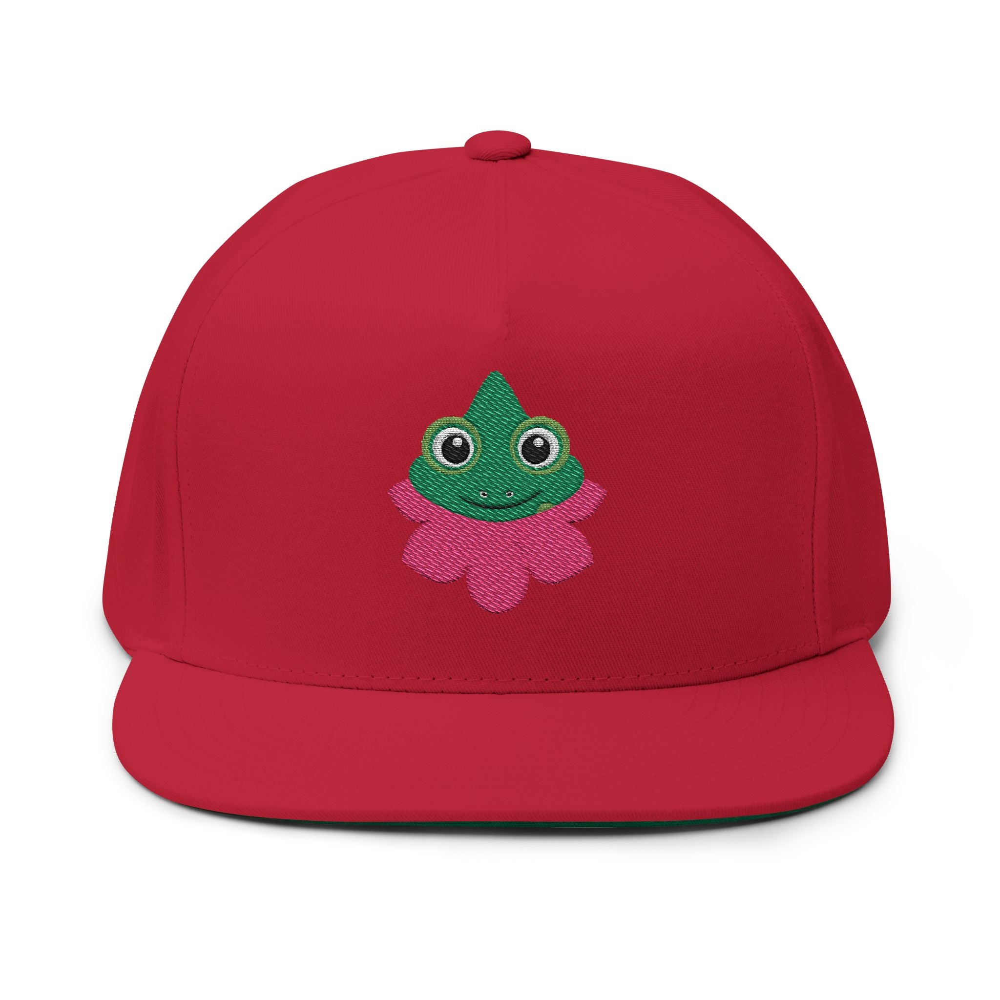 Red cap with a green and pink frog design on a white background