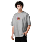 Person wearing a gray t-shirt with a colorful graphic design on a white background