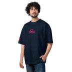 Man wearing a black t-shirt with pink text on a white background