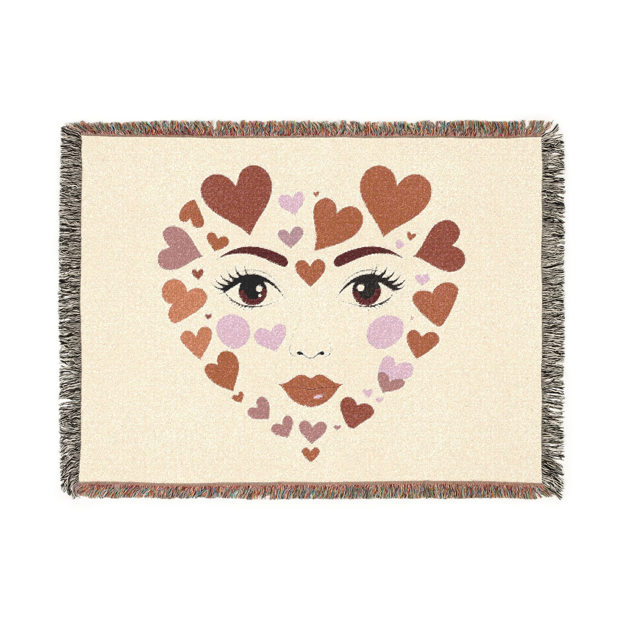 Blanket with heart-shaped face design on a beige background