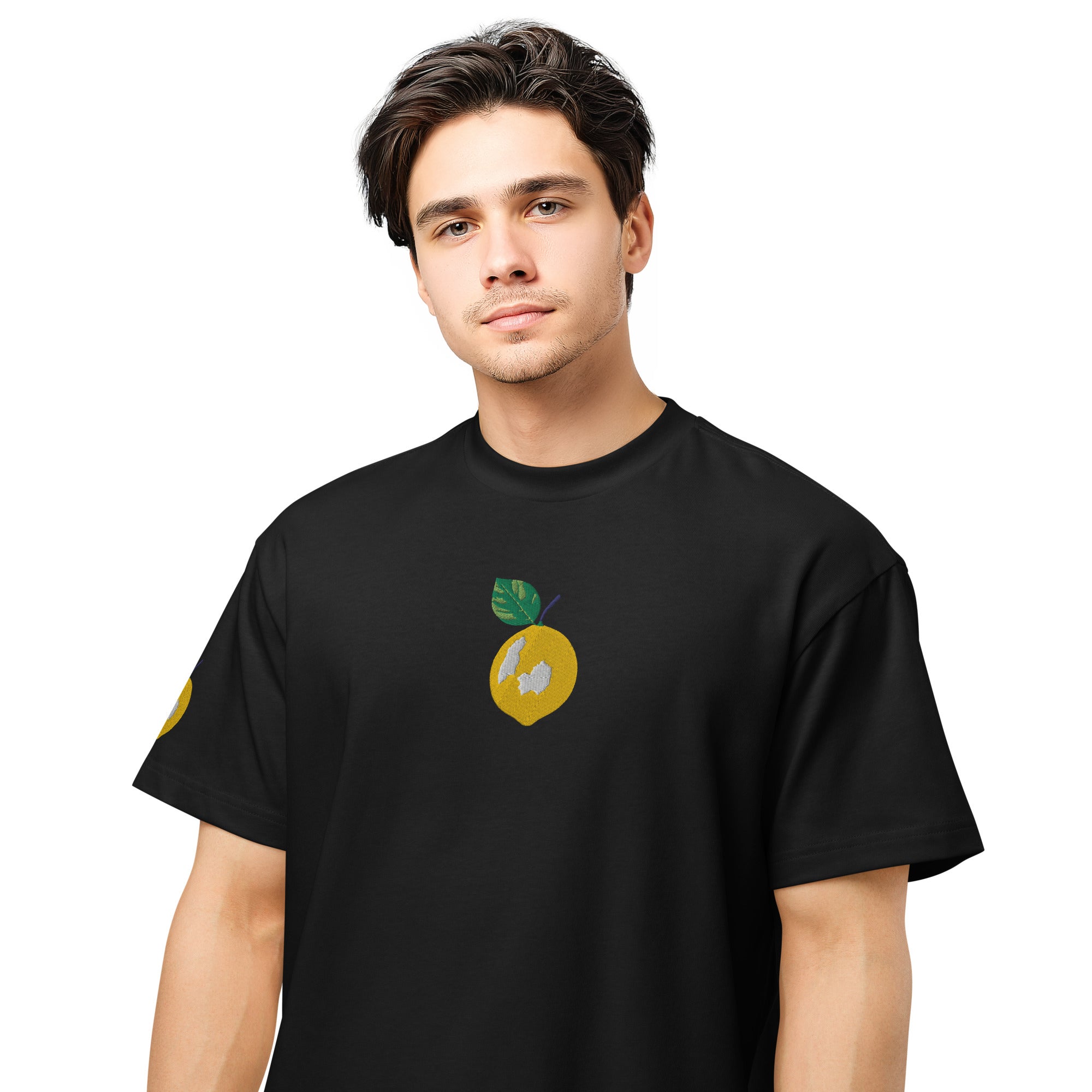 Person wearing a black t-shirt with a lemon graphic on a white background