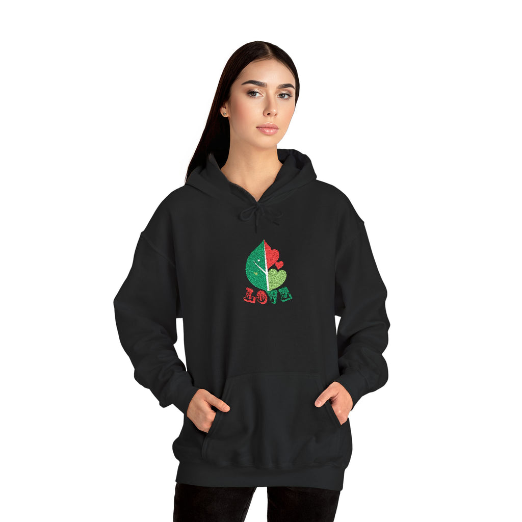 Person wearing a black hoodie with a colorful design on a white background