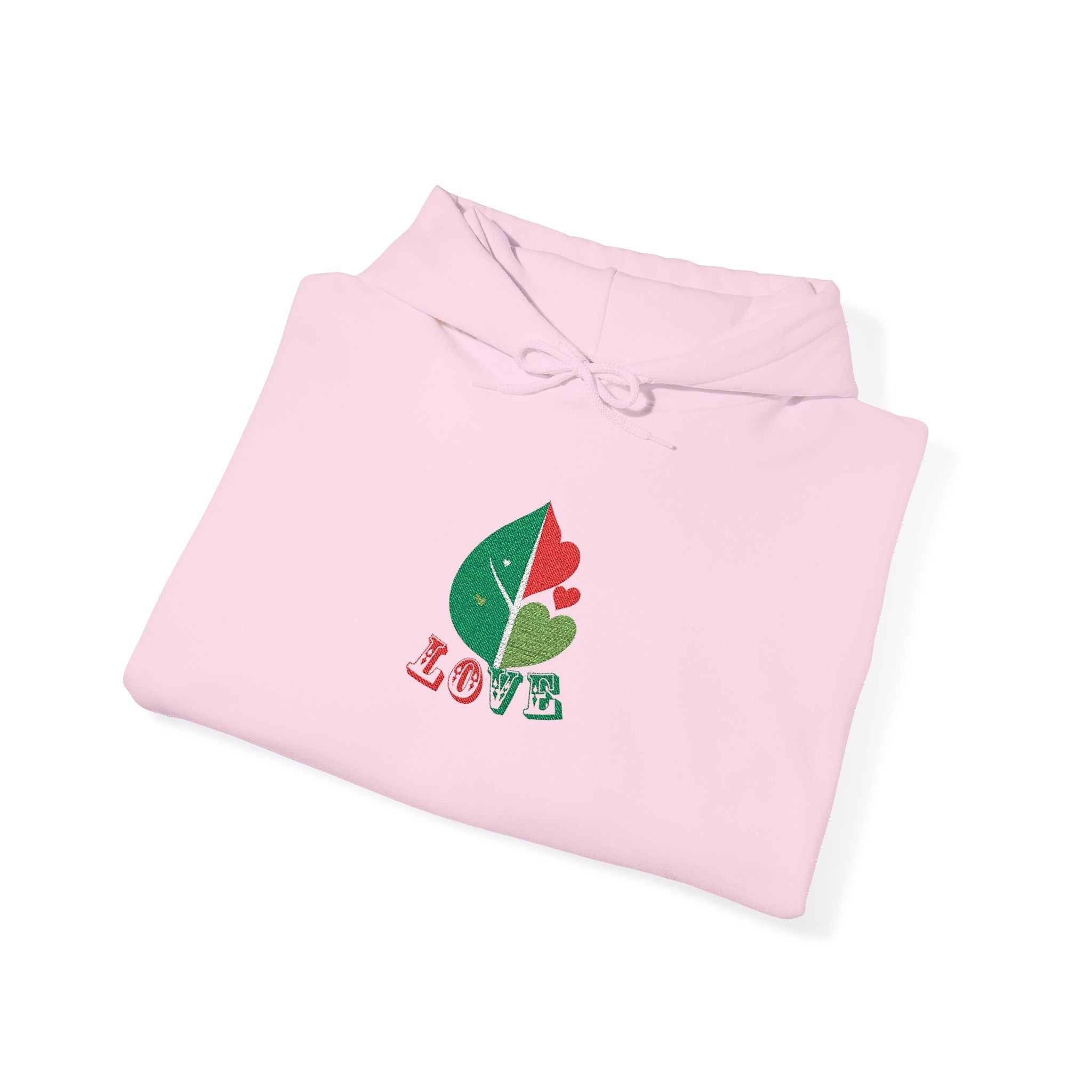 Pink shirt with a leaf design and 'LOVE' text on a white background