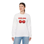 Person wearing a white sweatshirt with 'Cherry Bomb' design on a white background