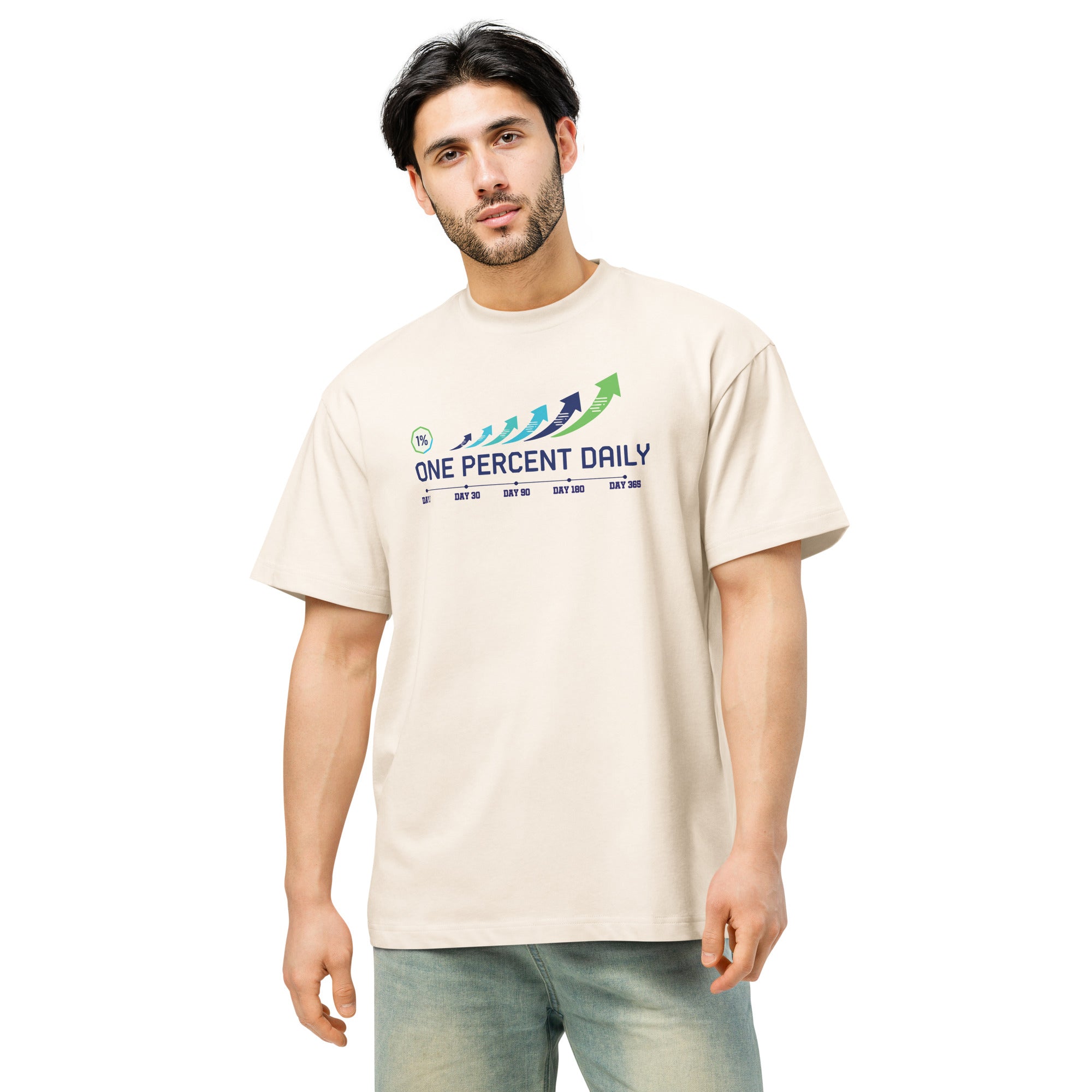 Man wearing a beige t-shirt with 'One Percent Daily' logo on a white background