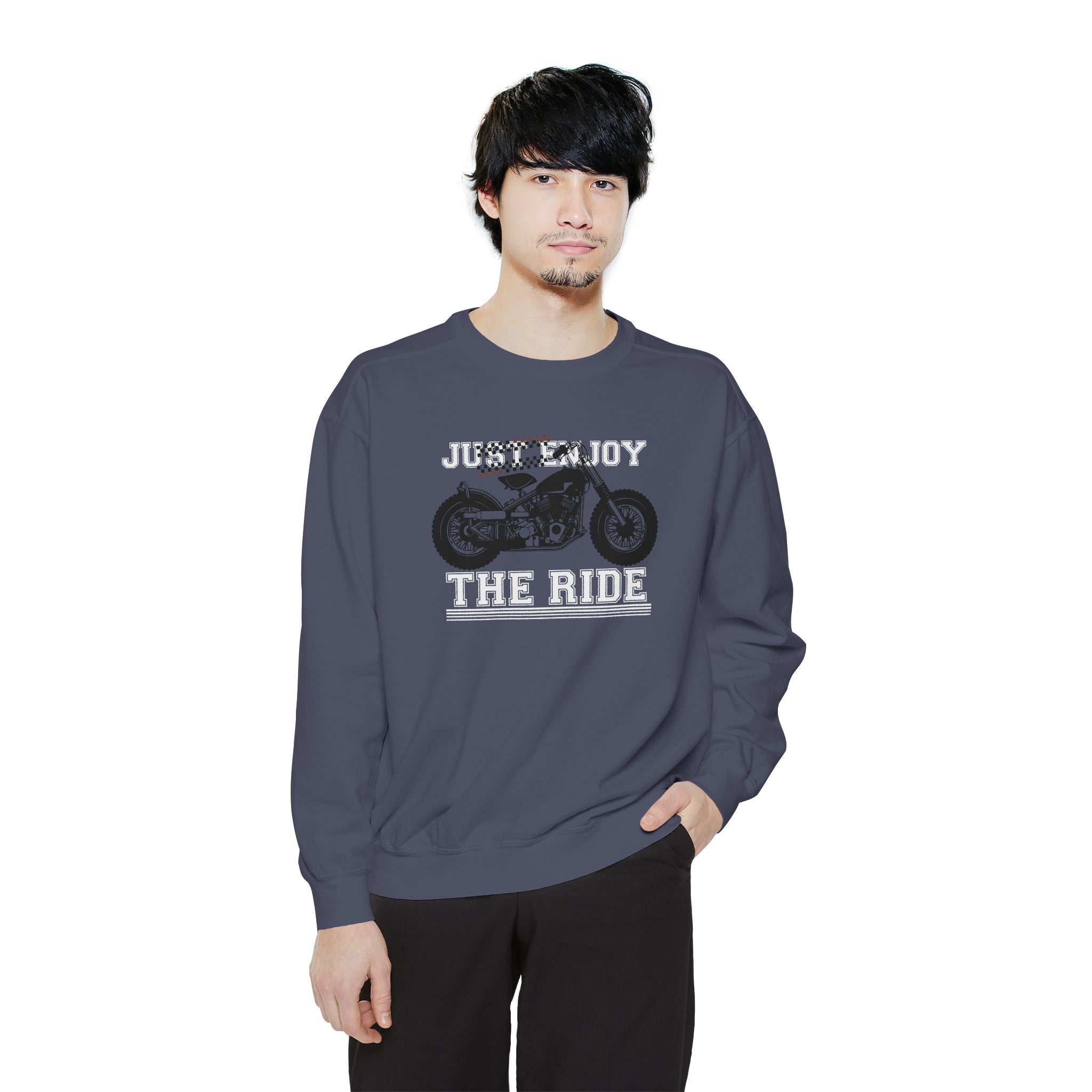 Person wearing a dark gray sweatshirt with a graphic and text on a white background