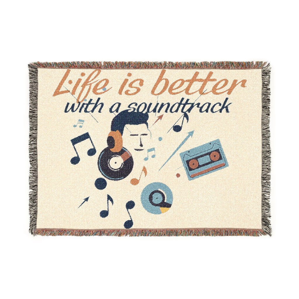 Blanket with music-themed design and 'Life is better with a soundtrack' text on a white background