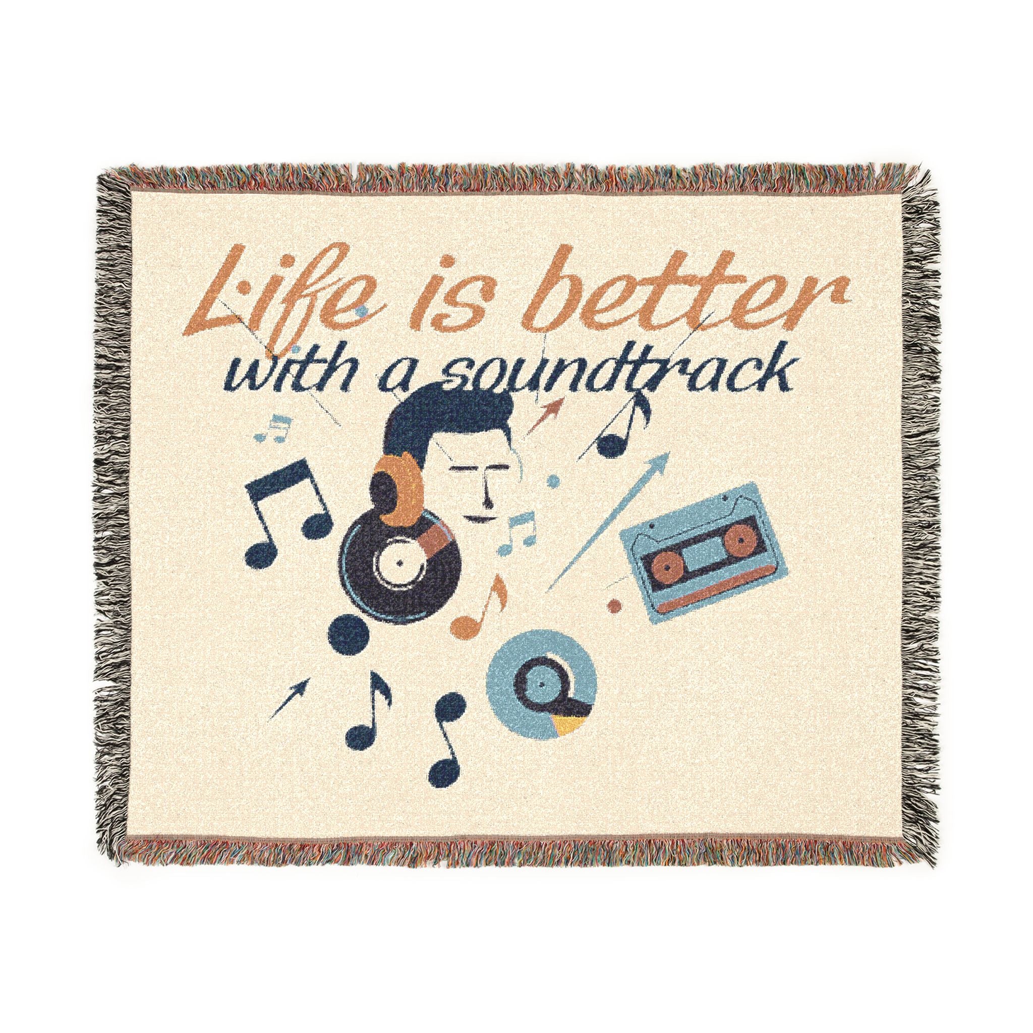 Blanket with music-themed design and 'Life is better with a soundtrack' text on a beige background.