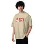 Person wearing a beige t-shirt with red text on a white background