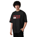 Person wearing a black t-shirt with red and white text on a white background