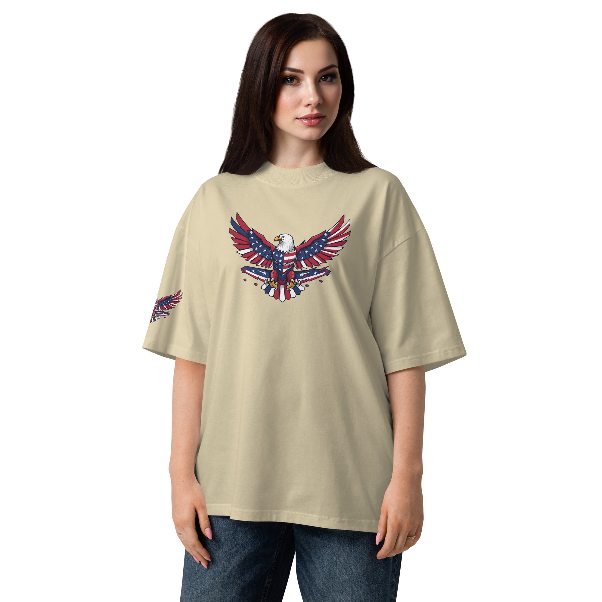 Woman wearing a beige t-shirt with an eagle design on a white background
