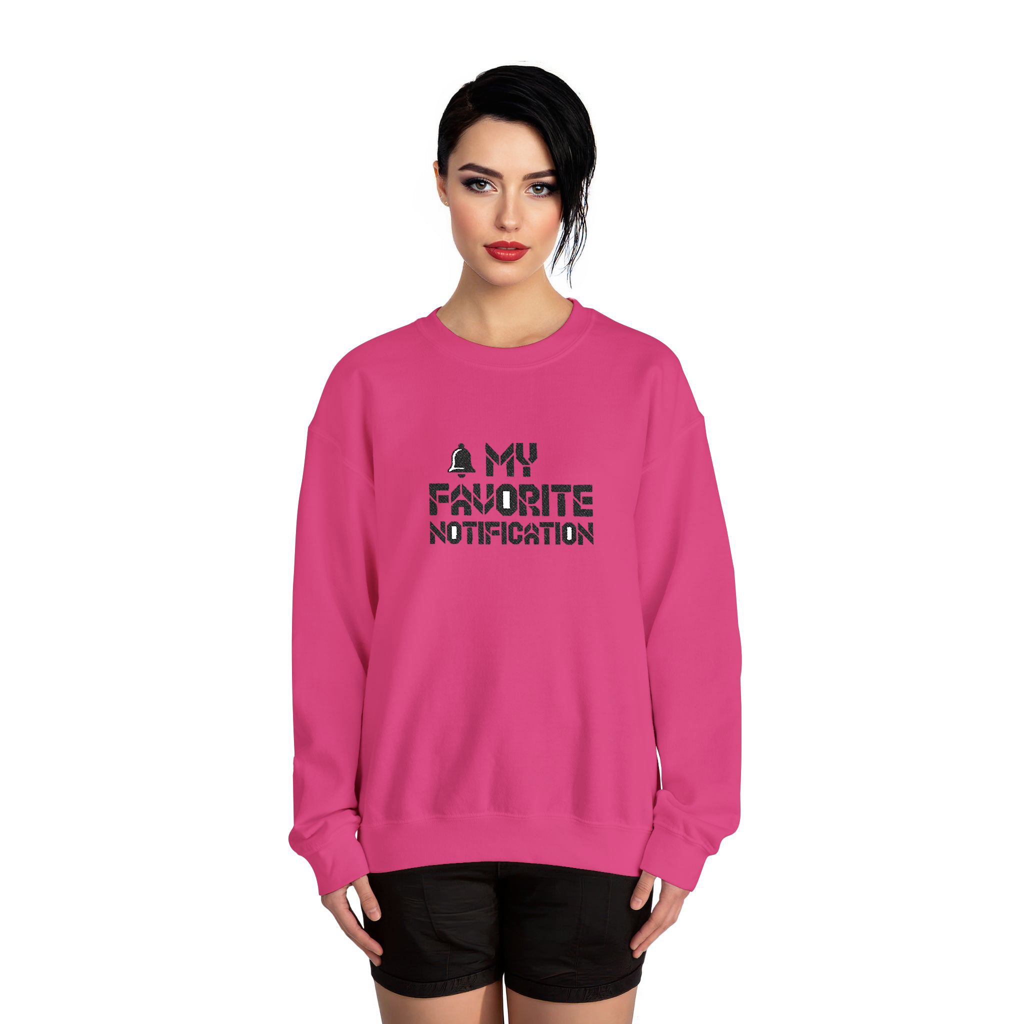 Woman wearing a pink sweatshirt with text design on a white background