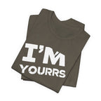 Stack of folded t-shirts with 'I'm yourrs' text on a white background