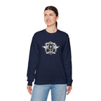 Person wearing a navy blue sweatshirt with a graphic design on a white background