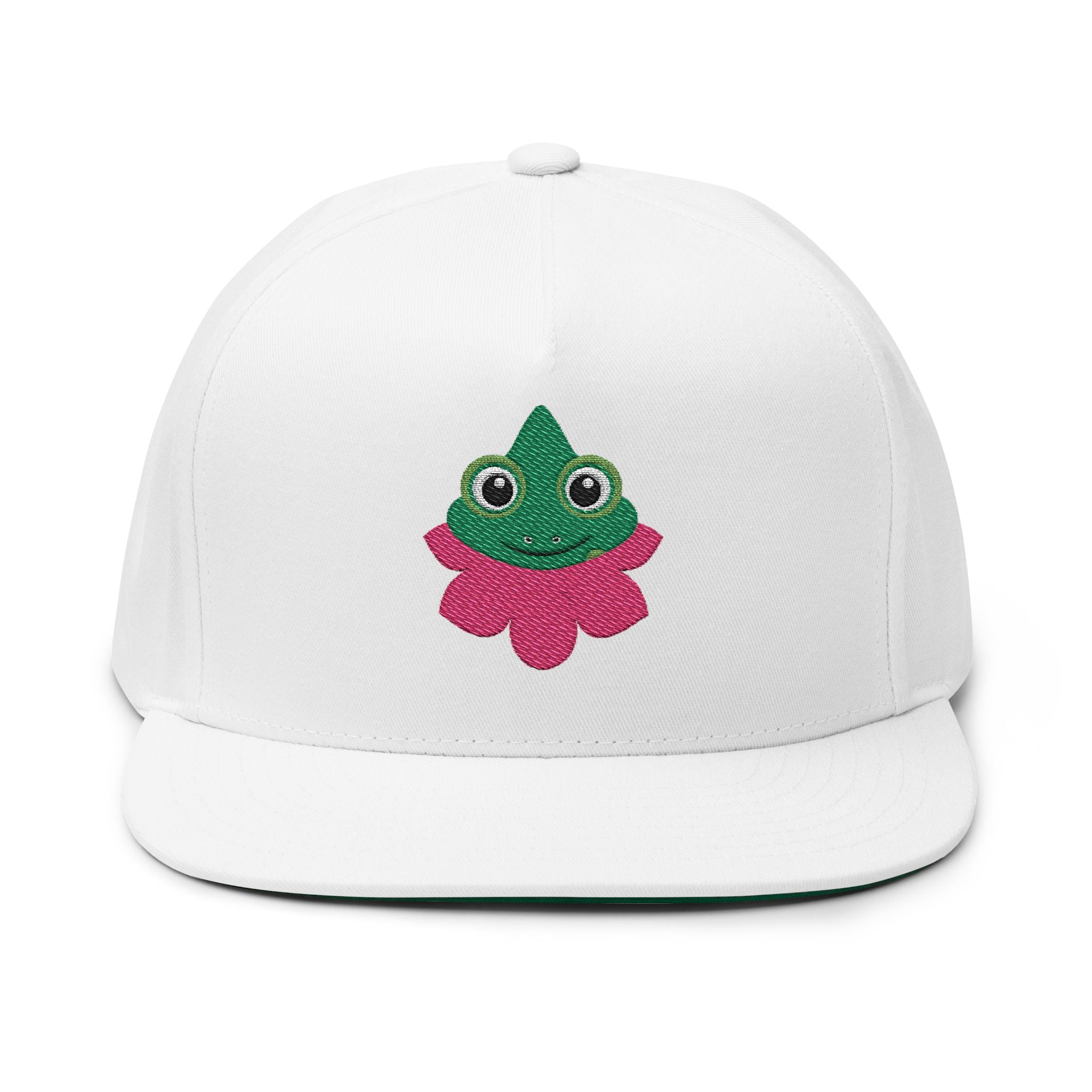 White cap with a green and pink frog design on a white background