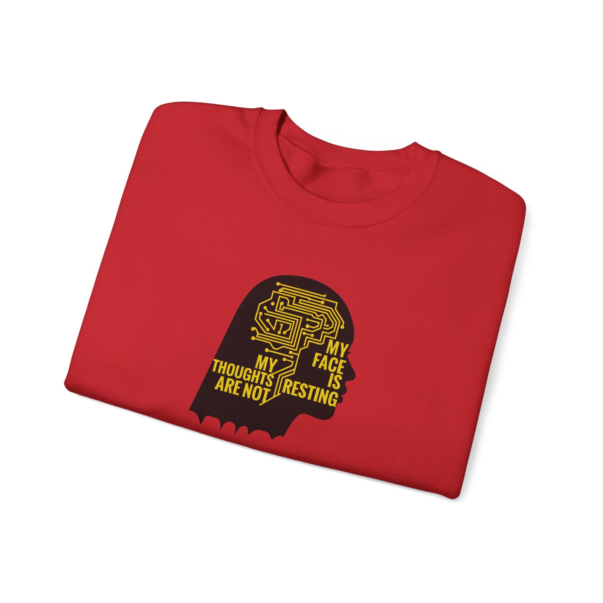 Folded red sweatshirt with black and yellow graphic and text on a white background