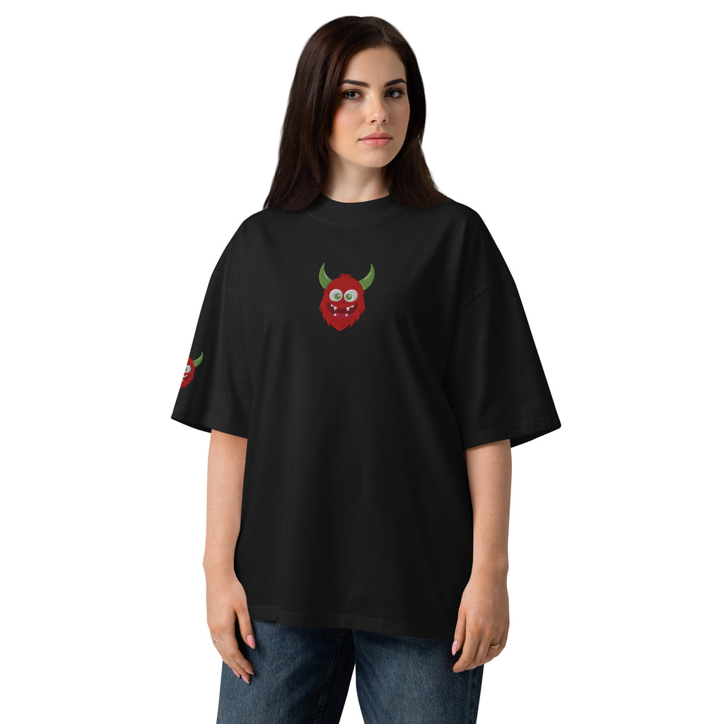 Person wearing a black t-shirt with a green and red logo on a white background