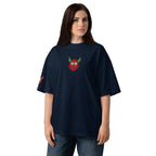 Person wearing a navy blue t-shirt with a green and red logo on a white background