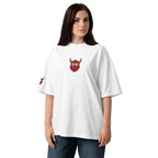 Person wearing a white t-shirt with a red and green graphic design on a white background