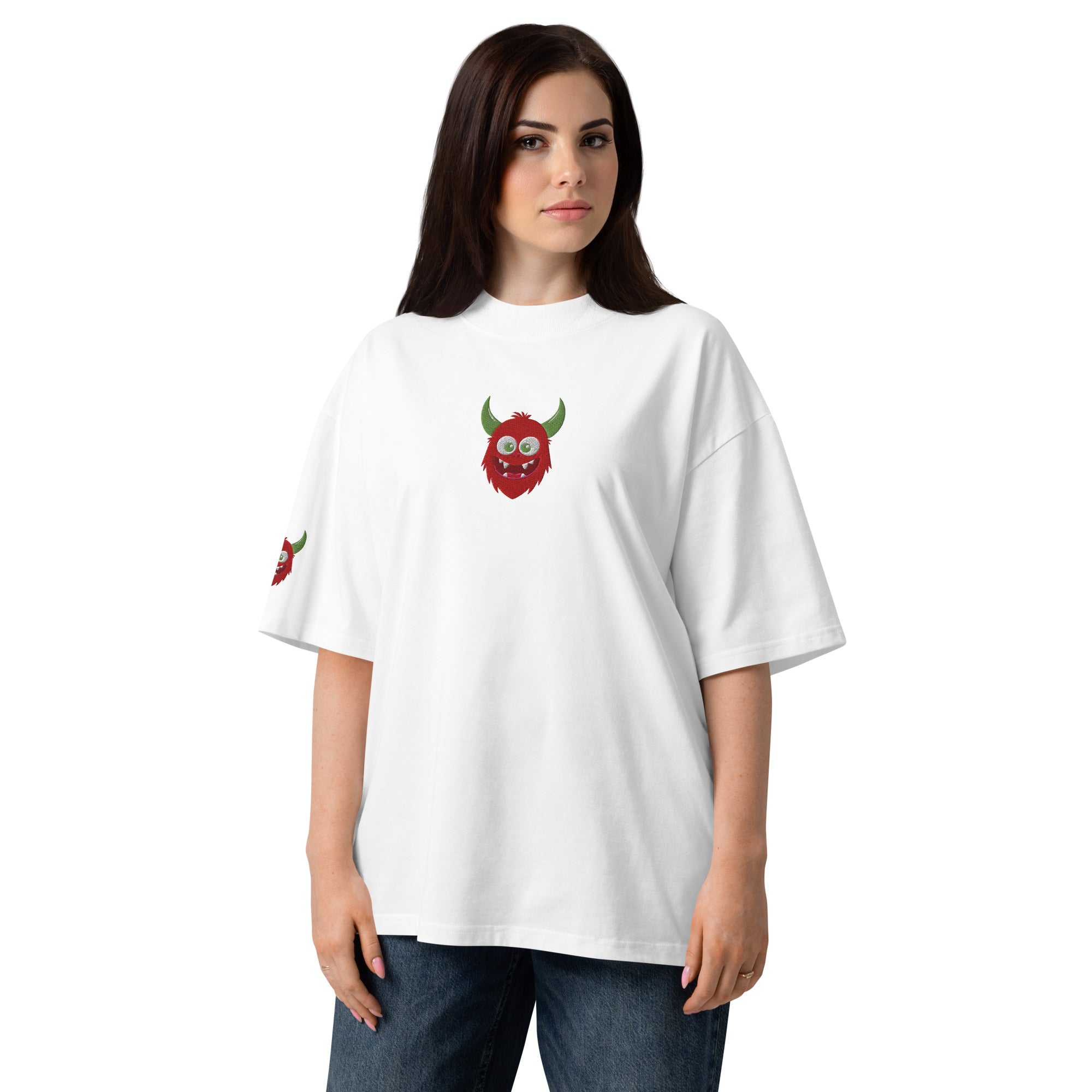 Person wearing a white t-shirt with a red and green graphic design on a white background