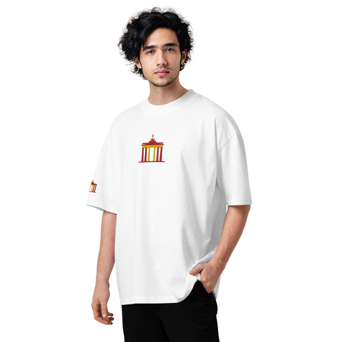 Person wearing a white t-shirt with a graphic design on a white background