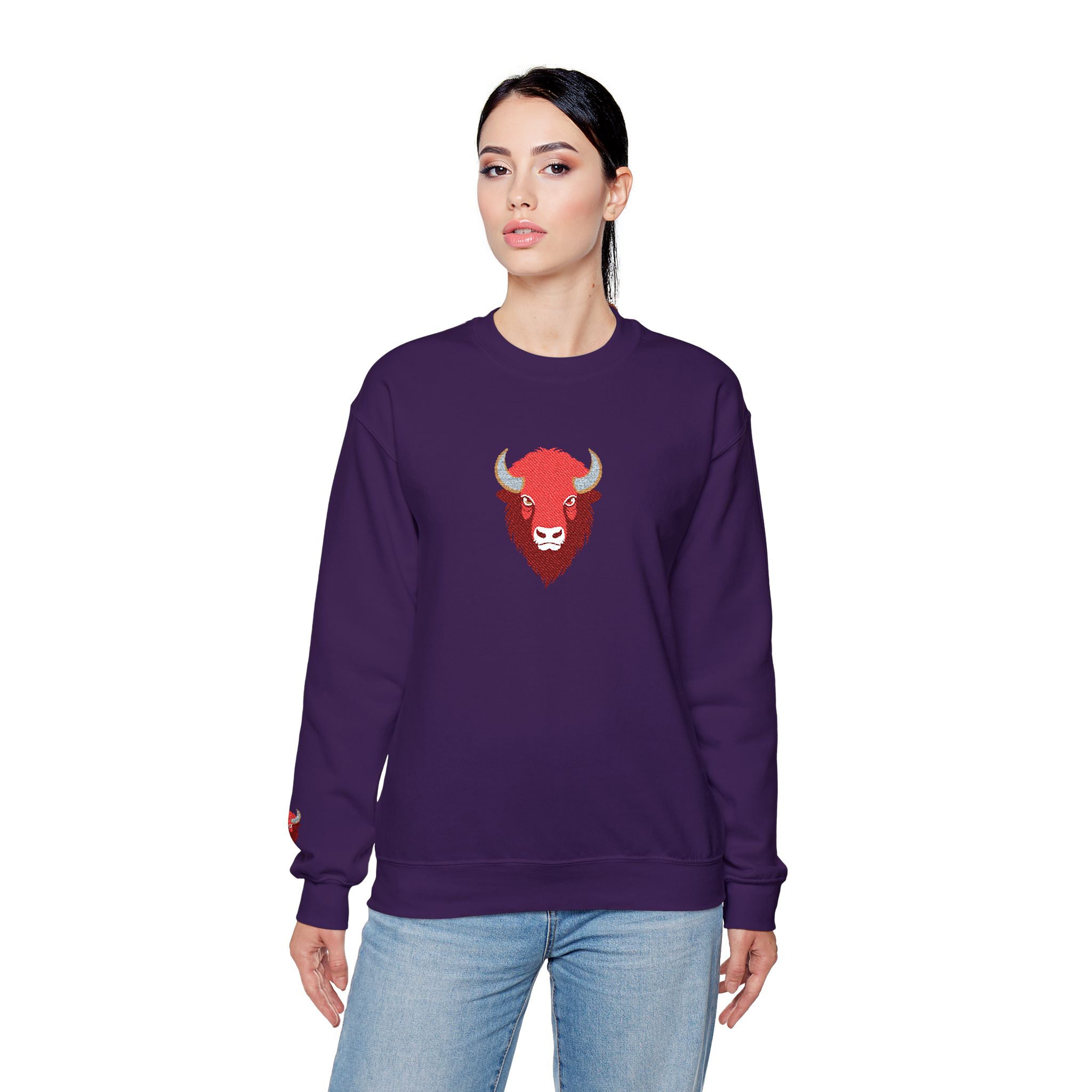 Person wearing a purple sweatshirt with a red bull logo on a white background