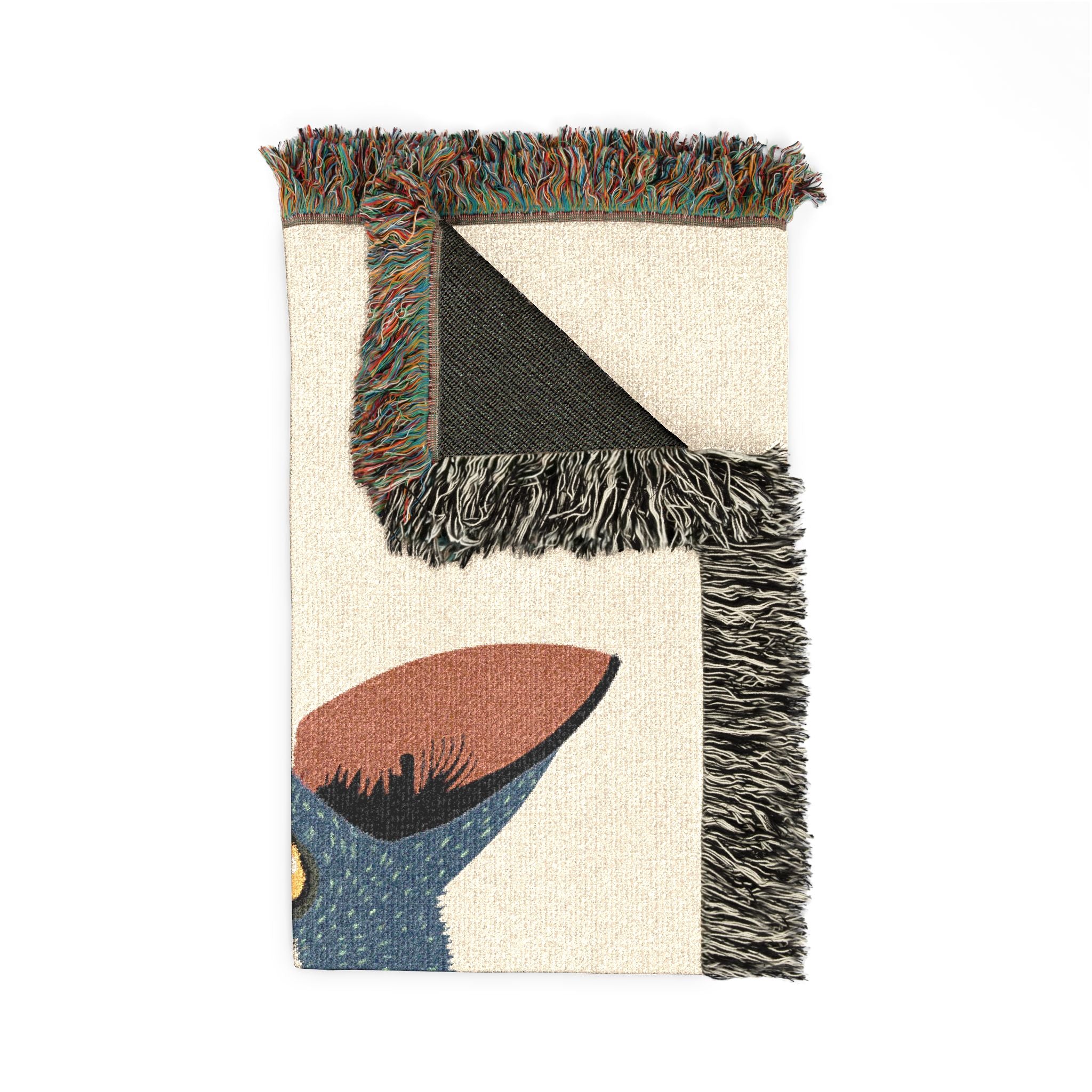 Decorative rug with abstract design and fringed edges on a white background