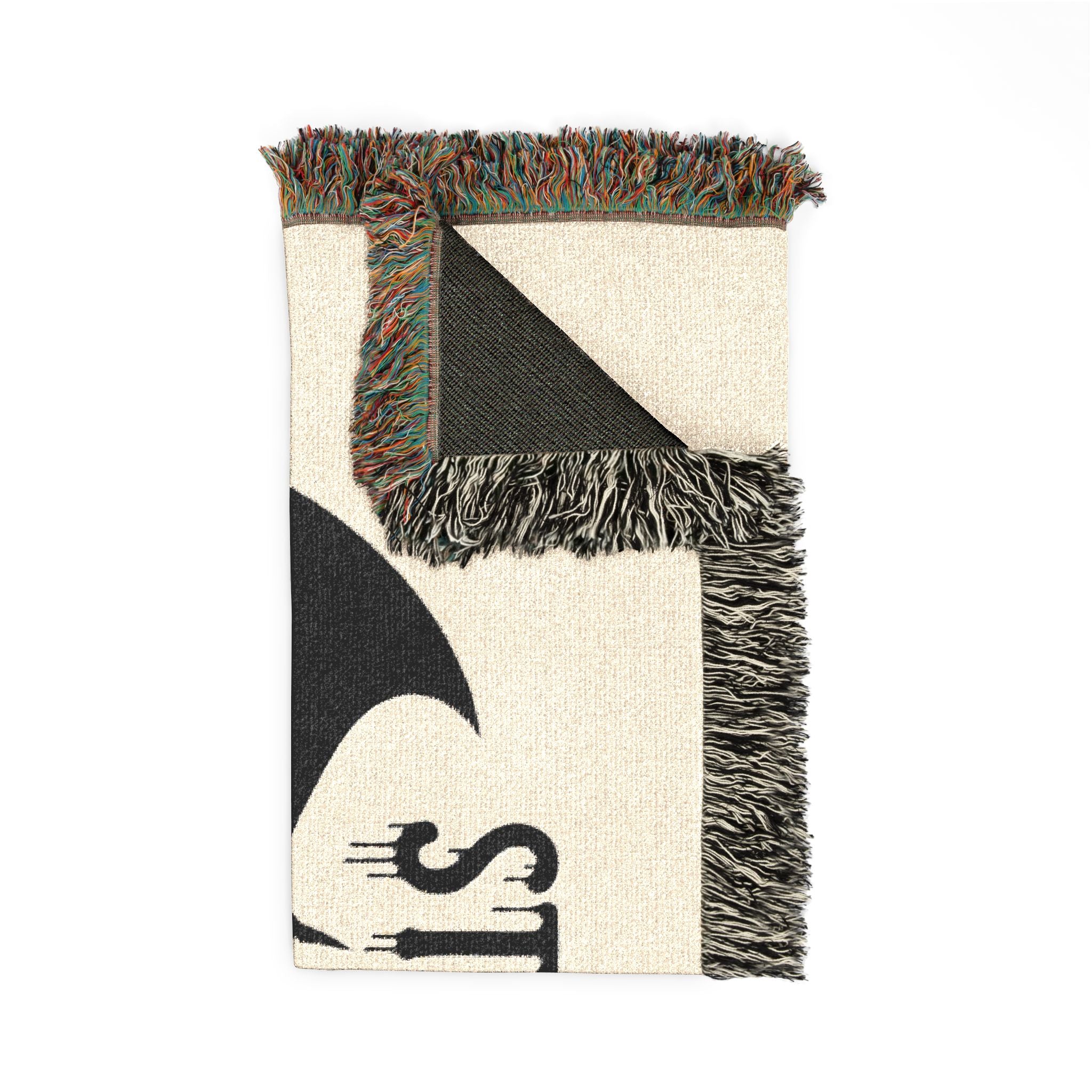 Woven blanket with geometric pattern and fringe on a white background