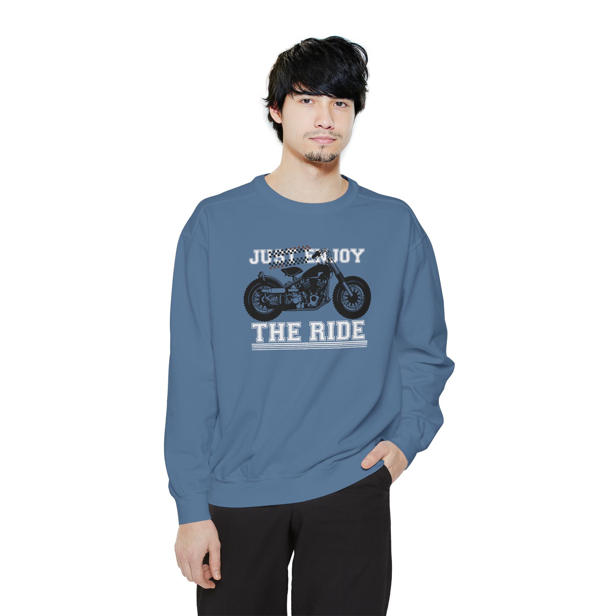 Person wearing a blue sweatshirt with a motorcycle graphic and text on a white background