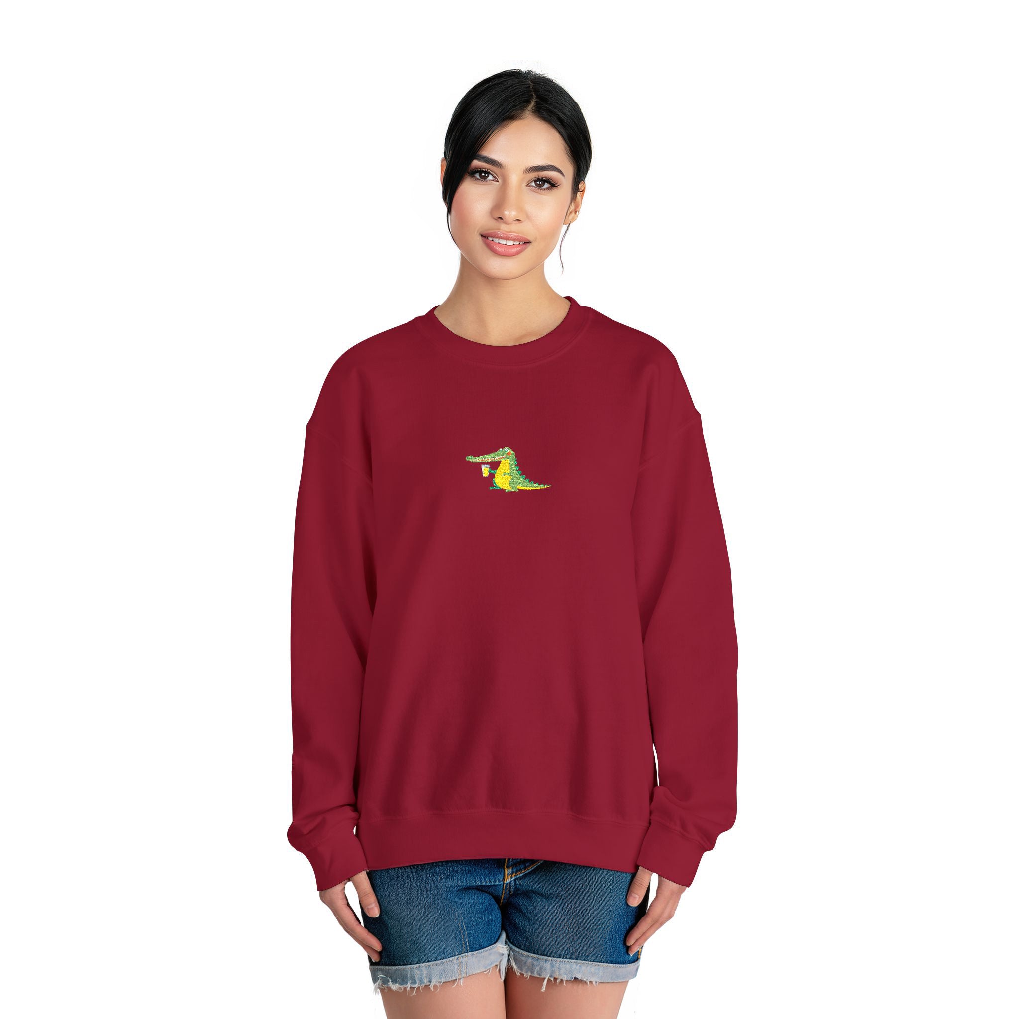 Woman wearing a red sweatshirt with a small design on a white background