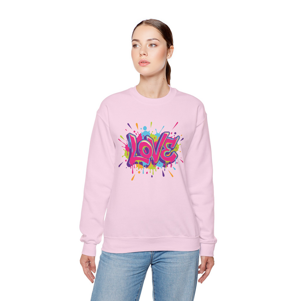 Person wearing a pink sweatshirt with colorful 'LOVE' graphic on a white background