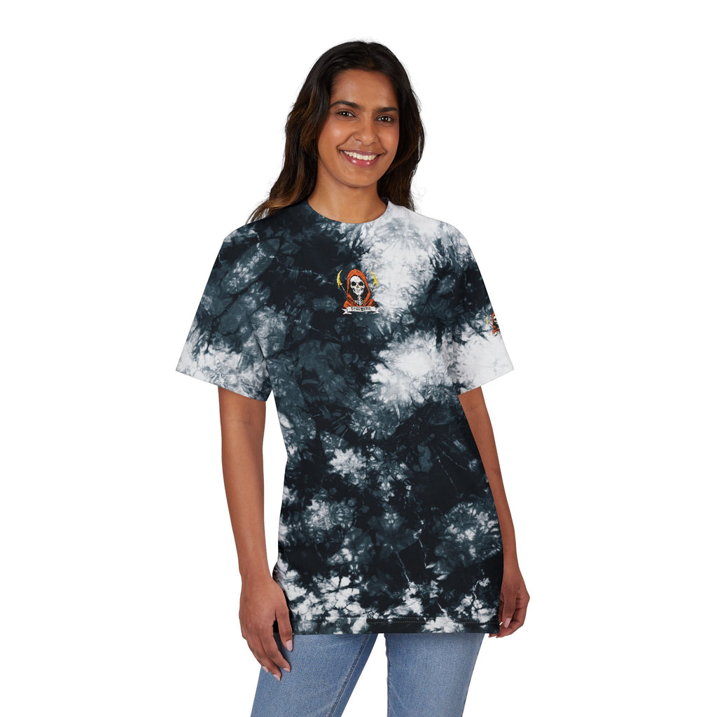 Person wearing a tie-dye t-shirt with a small graphic on a white background