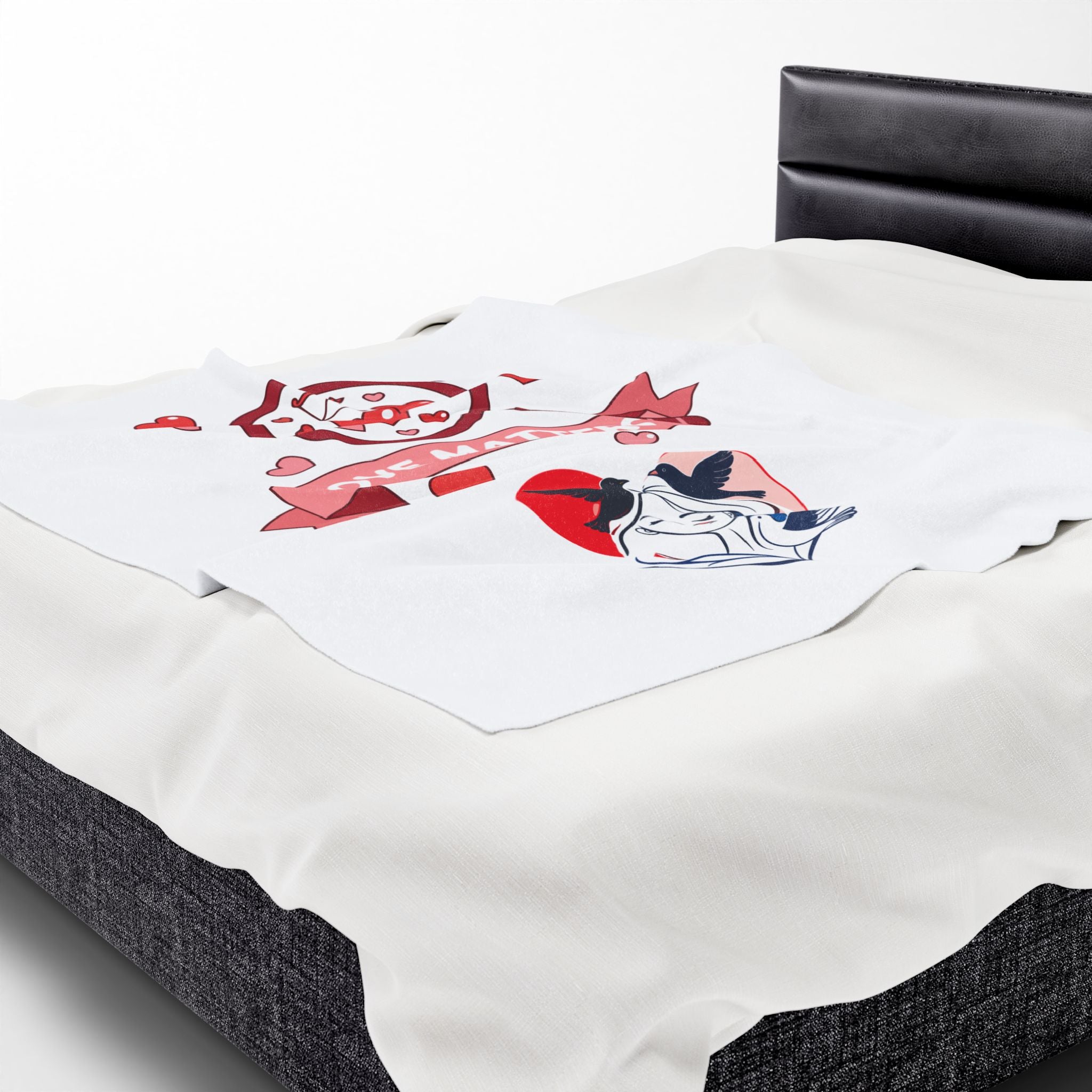 Mattress with a decorative pillow featuring cartoon characters on a white background