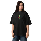 Woman wearing a black t-shirt with a green and red logo on a white background