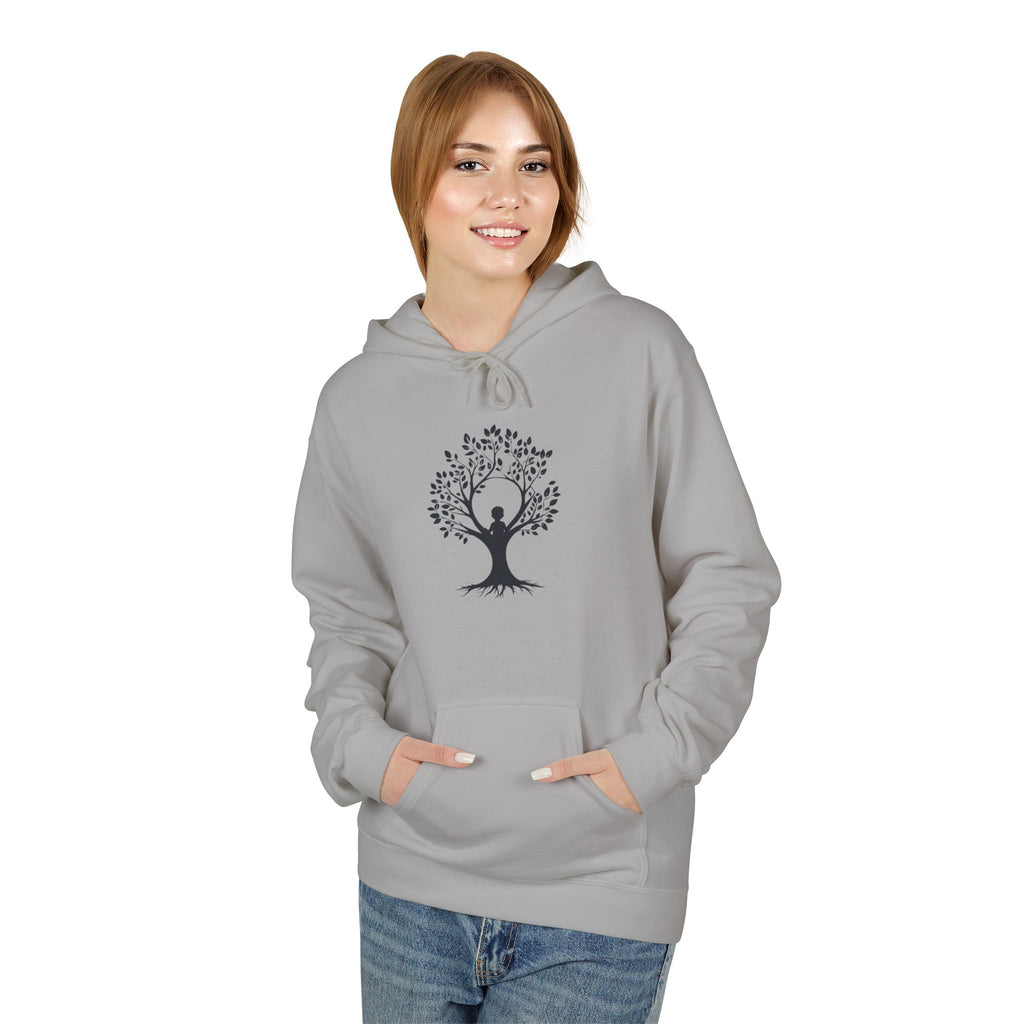 Person wearing a gray hoodie with a tree design on a white background