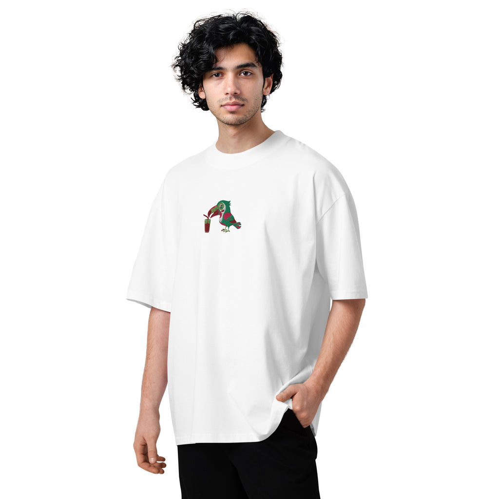 Person wearing a white t-shirt with a small graphic on a white background