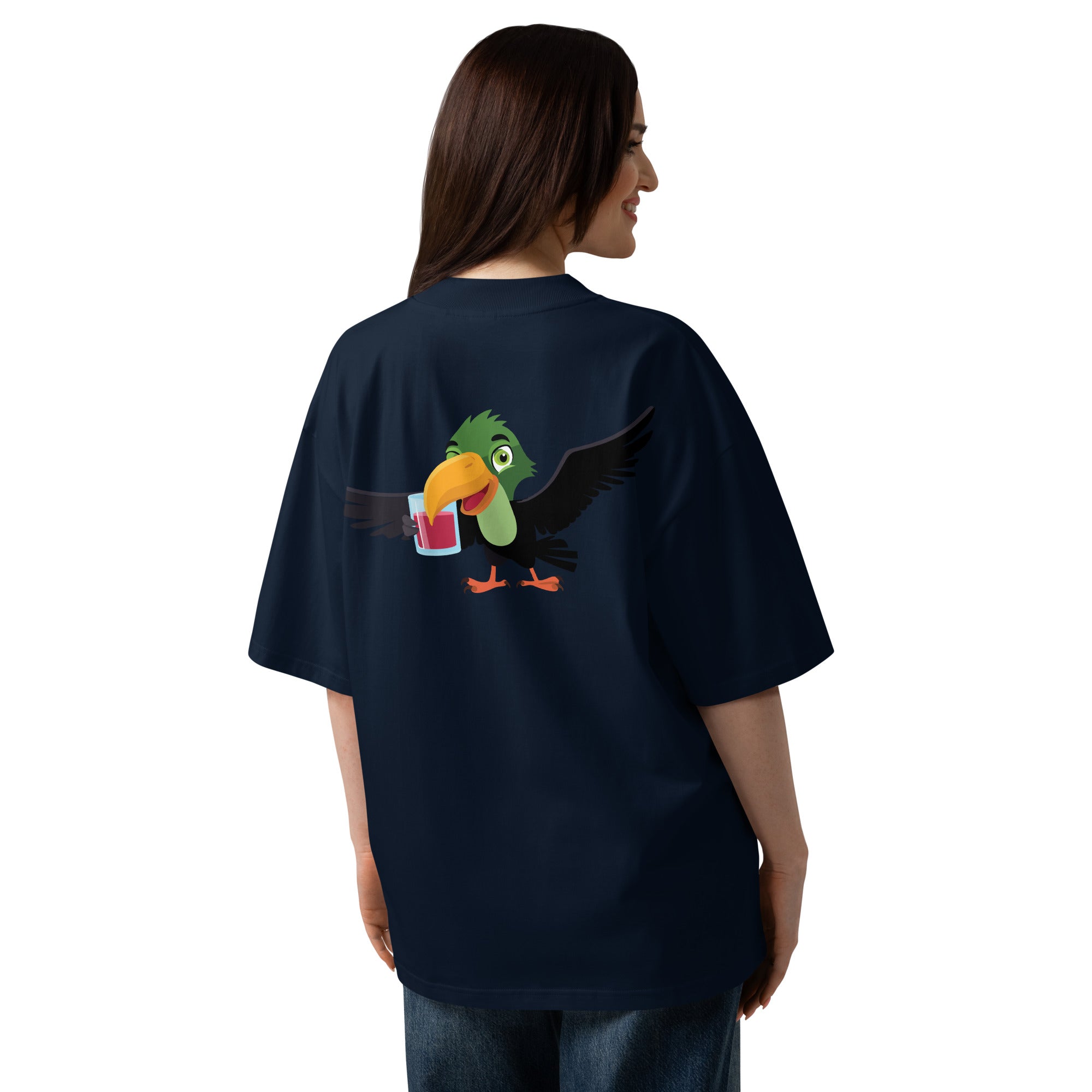 Person wearing a black t-shirt with a colorful parrot design on the back, standing against a white background.