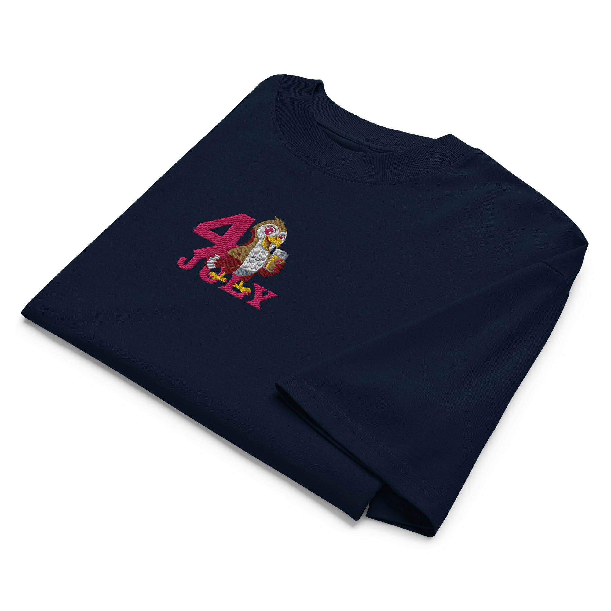 Folded navy blue t-shirt with colorful graphic on a white background